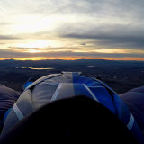 Wingsuiting from a balloon at sunrise